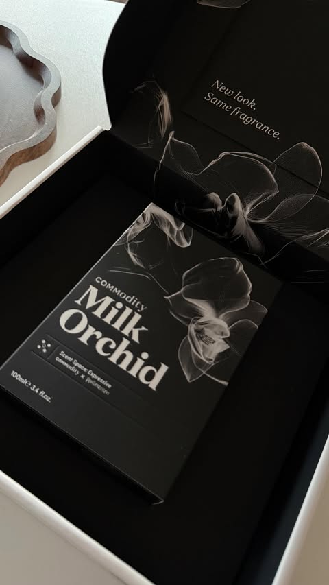 Instagram post by @mon_isiaa for Commodity Fragrances. Caption reads: Milk Orchid 🌸🥛 @commodity Creamy, soft, and....
