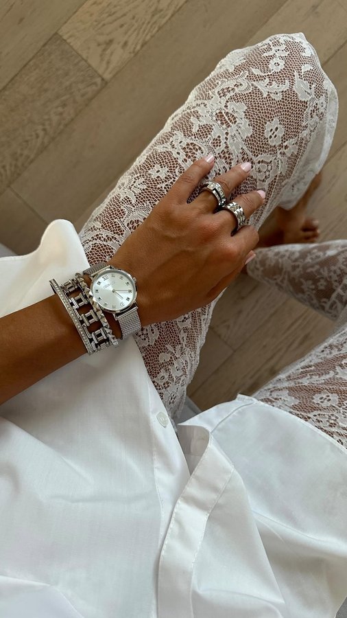 Instagram post by @cristinasurdu for COEUR DE LION Jewellery. Caption reads: 1,2,3? 3 white looks for 3 different occasions 🤍.....