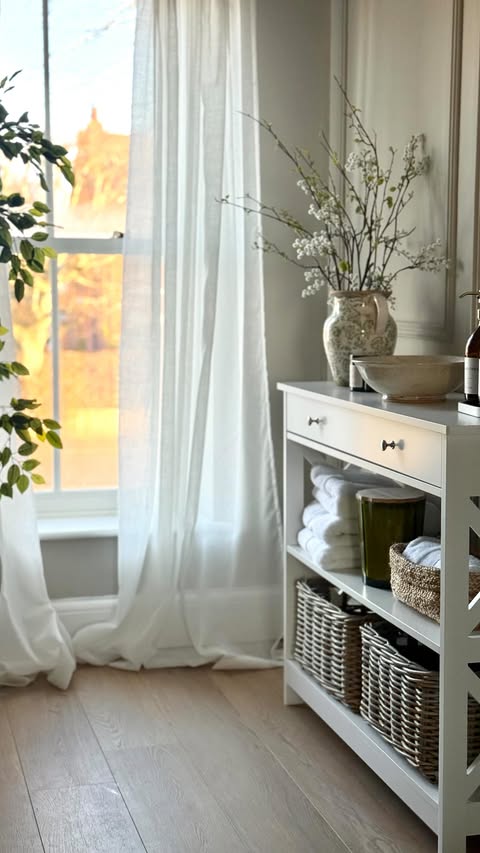 Instagram post by @the_hollies_1 for Yaheetech. Caption reads: [...] wooden X-shaped console table from....