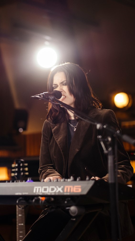 Instagram post by @_maggiemiles for Yamaha. Caption reads: Maggie Miles performs “BeNice” on the Yamaha MODX....