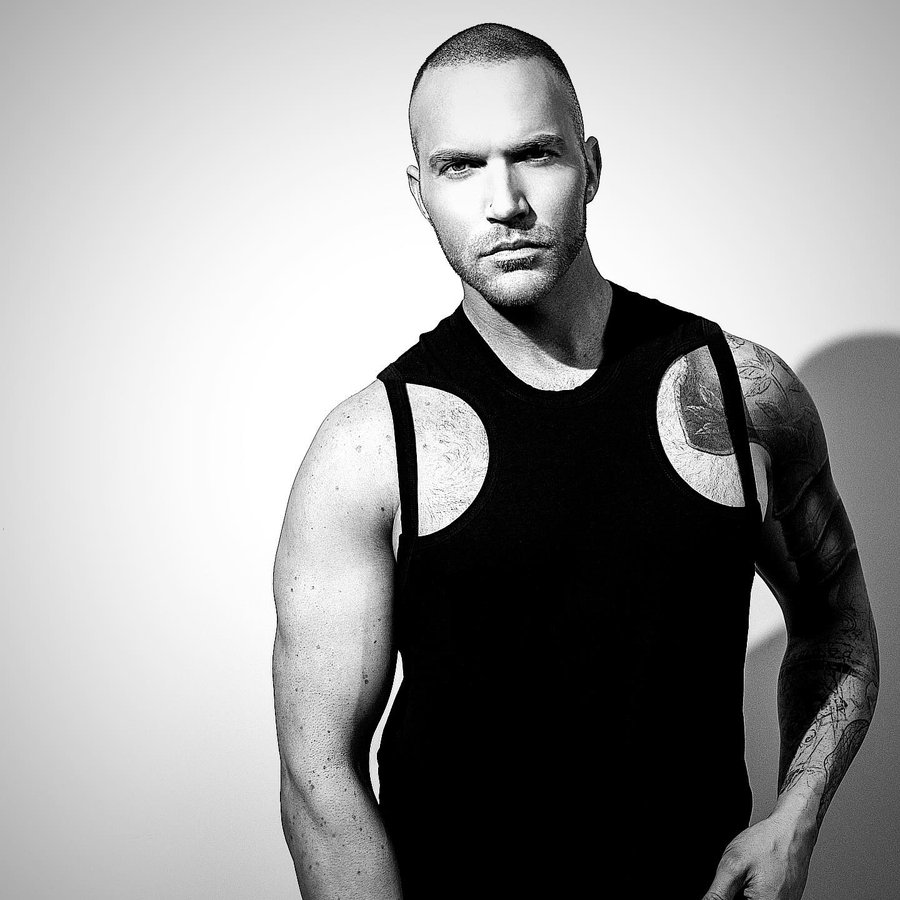 Instagram post by @dgarrettlund for Andrew Christian. Caption reads: not a lot going on at the moment..