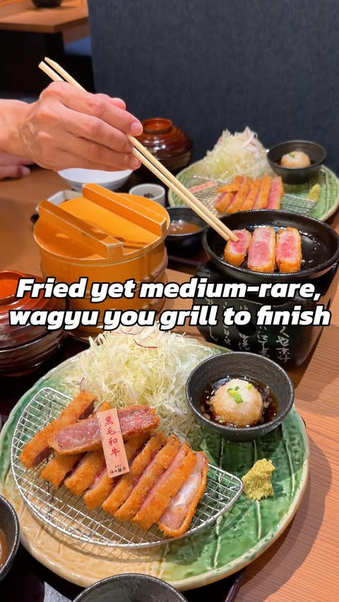 Instagram post by @hiroko_japan.travel for Gyukatsu Kyoto Katsugyu. Caption reads: [...] medium-rare inside? This is Gyukatsu Kyoto....