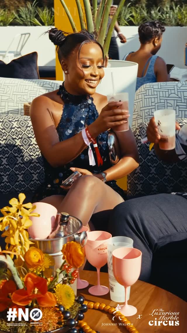 Instagram post by @missshozi for Johnnie Walker. Caption reads: #AD | Still buzzing from Day 1 at the Luxurious....