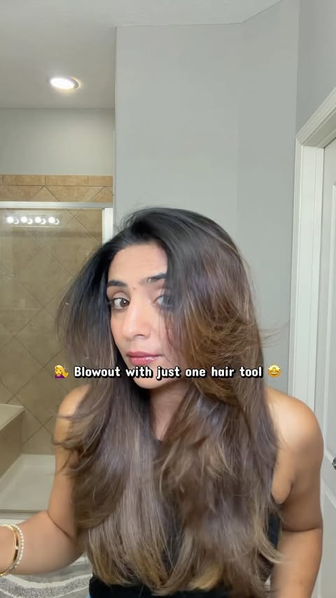 Instagram post by @esthetician_munira for L’ange Hair. Caption reads: Link 🔗 Hairdryer brush 🤩 @langehair #ad....