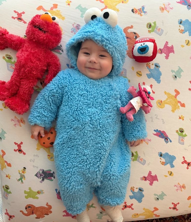 Instagram post by @dannypellegrino for Sesame Street. Caption reads: Happy 1st Halloween from our little Cookie....