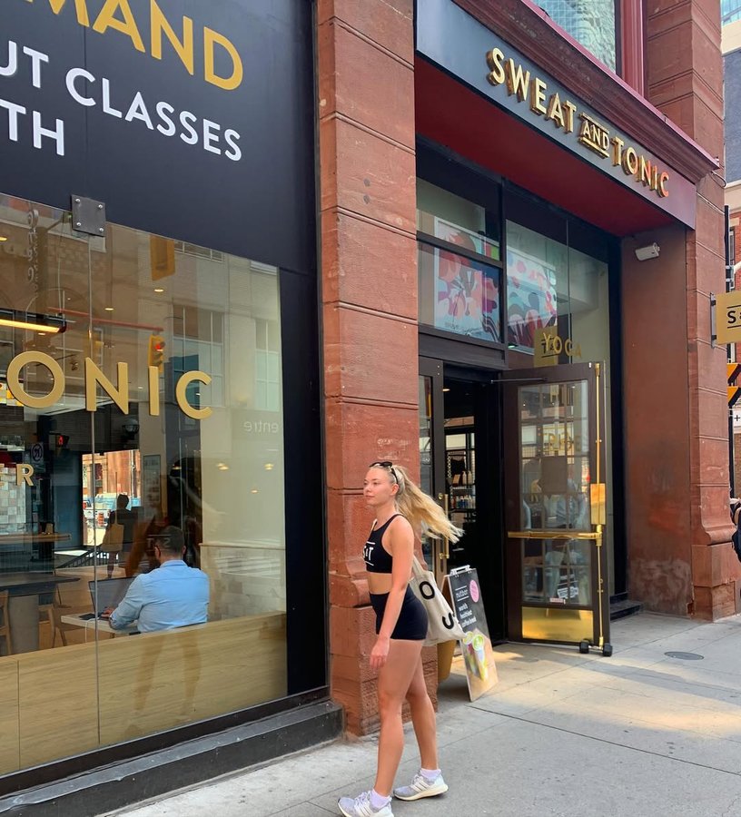 Instagram post by @emiliaamccarthy for Sweat and Tonic. Caption reads: [...] be back with the sweat fam now that....