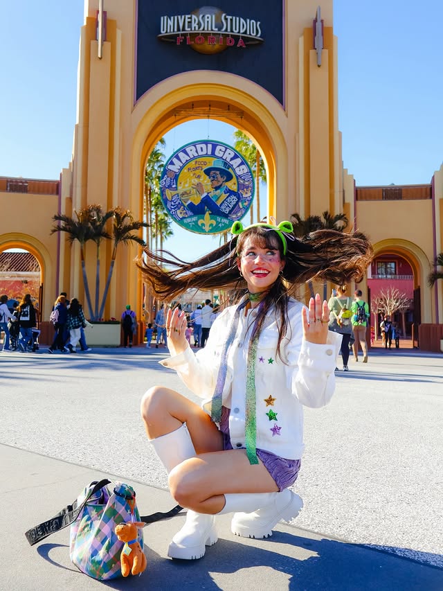 Instagram post by @magicwithmeg for Universal Orlando Resort. Caption reads: HAPPY @universalorlando MARDI GRAS SEASON !!!....