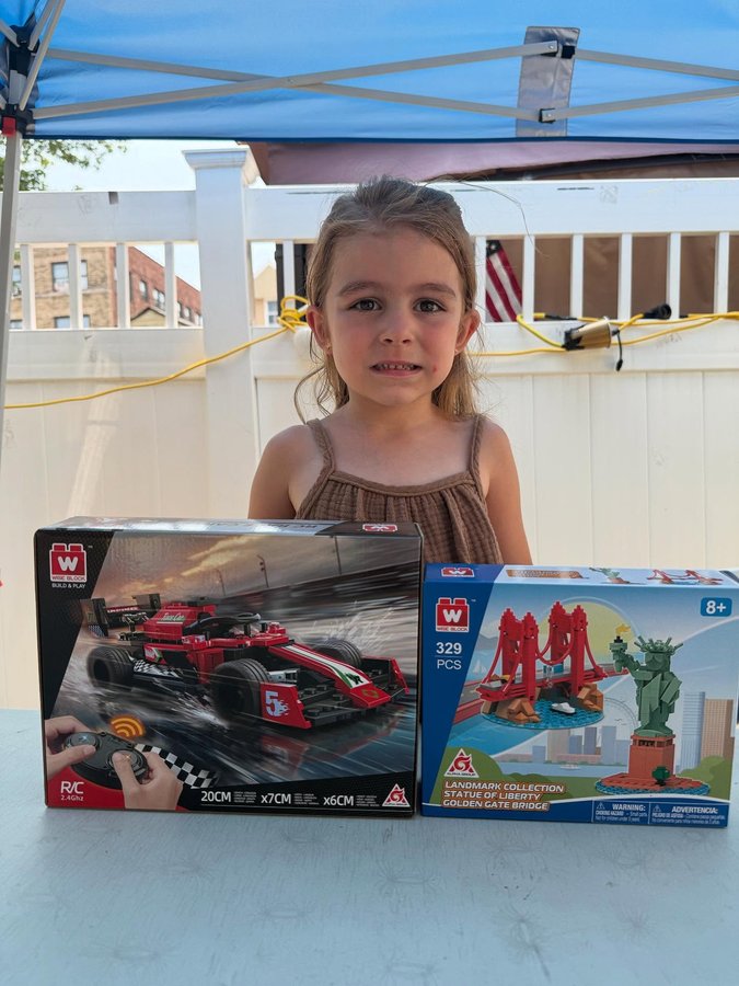 Instagram post by @stellaberberi20 for Alpha Toys. Caption reads: I love playing with construction toys, and I....