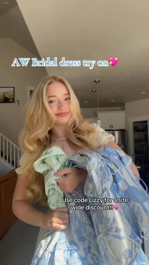 Instagram post by @lizzy__ricks for AW Bridal. Caption reads: [...] wide discount<3 @aw.bridal #promdress....