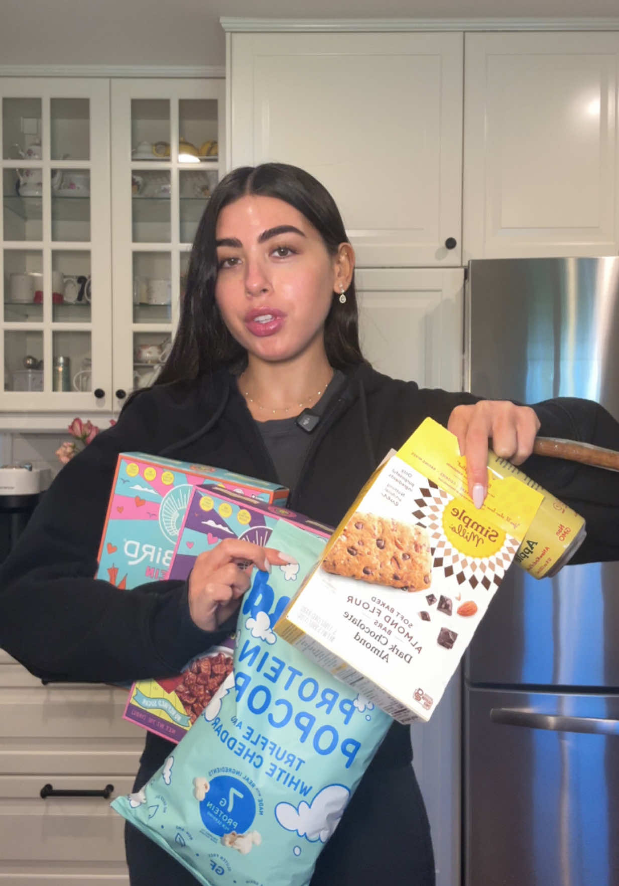 TikTok post by @jeanne_stuart for KhloudFoods. Caption reads: [...] go to snacks that I always crave....