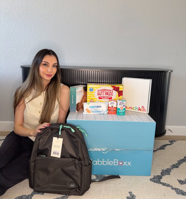 Instagram post by @homemiamii for BabbleBoxx. Caption reads: [...] share the New Mom Survival Kit from....