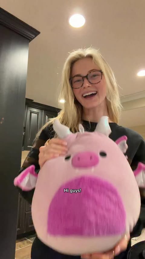 Instagram post by @ryleearnold1 for Squishmallows. Caption reads: Spend the day with me cuddling my Squishmallows!....