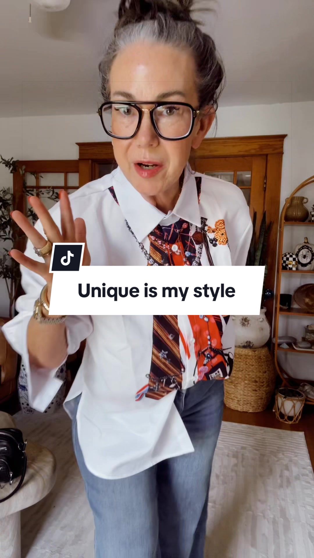 TikTok post by @aestheticaleestyles for uoozee. Caption reads: Loving this faux tie top by @UOOZEE US #uniquetop....