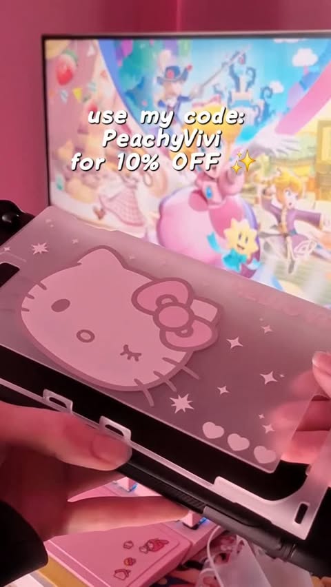 Instagram post by @peachshandholder for Geekshare. Caption reads: Hello Kitty Switch 2 case from @geekshareplus !!....