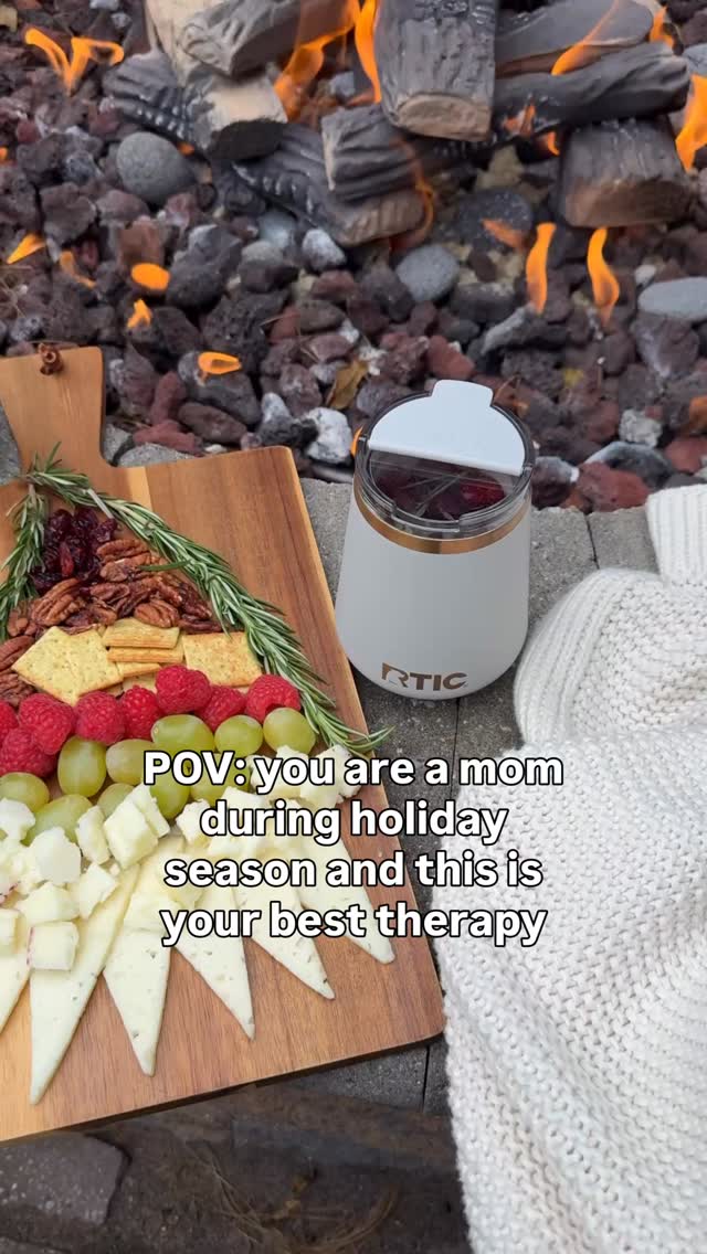 Instagram post by @carla.bushey for RTIC Outdoors. Caption reads: [...] A cozy fire, a festive drink, and my....