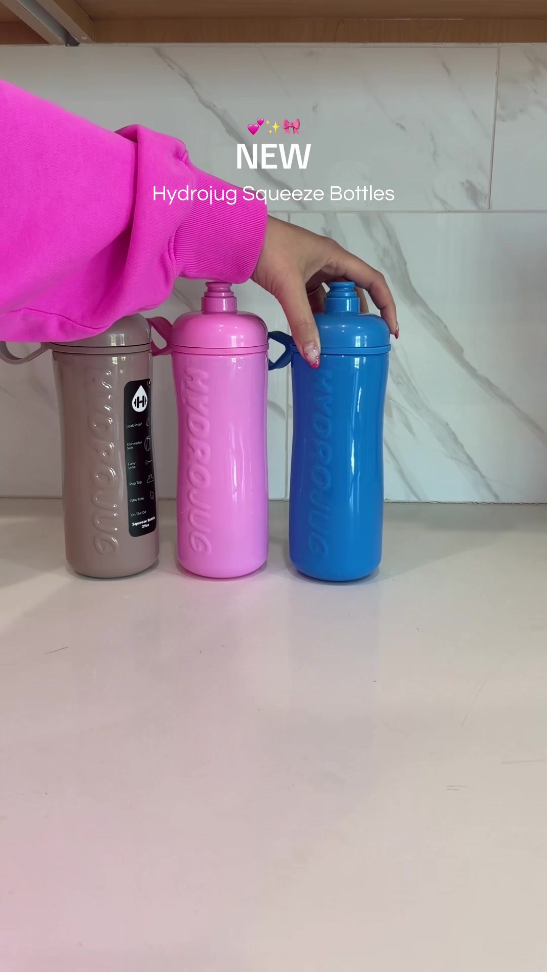 TikTok post by @kierra_b_lifestyle for HYDROJUG. Caption reads: The new HYDROJUG squeeze bottles are perfect [...].
