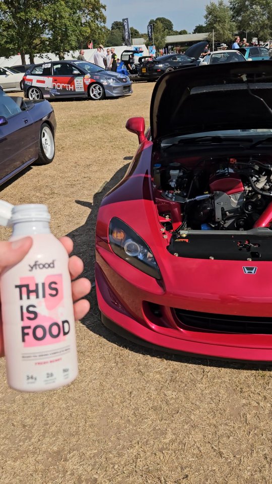 Instagram post by @adamc3046 for Yfood. Caption reads: Finding my @yfood's twin at TunerFest to celebrate....