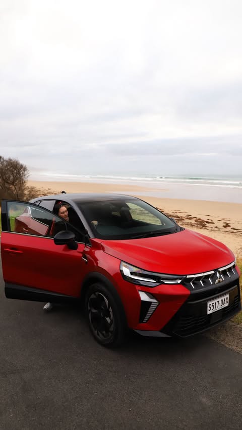 Instagram post by @andreamichelleindy for Mitsubishi Motors. Caption reads: [...] Mitsubishi dealer or visit the Mitsubishi....