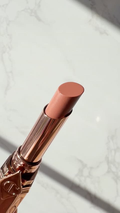 Instagram post by @lia.beautyuk for Charlotte Tilbury. Caption reads: Brand new Charlotte Tilbury Blush Balm Lip Tint in....