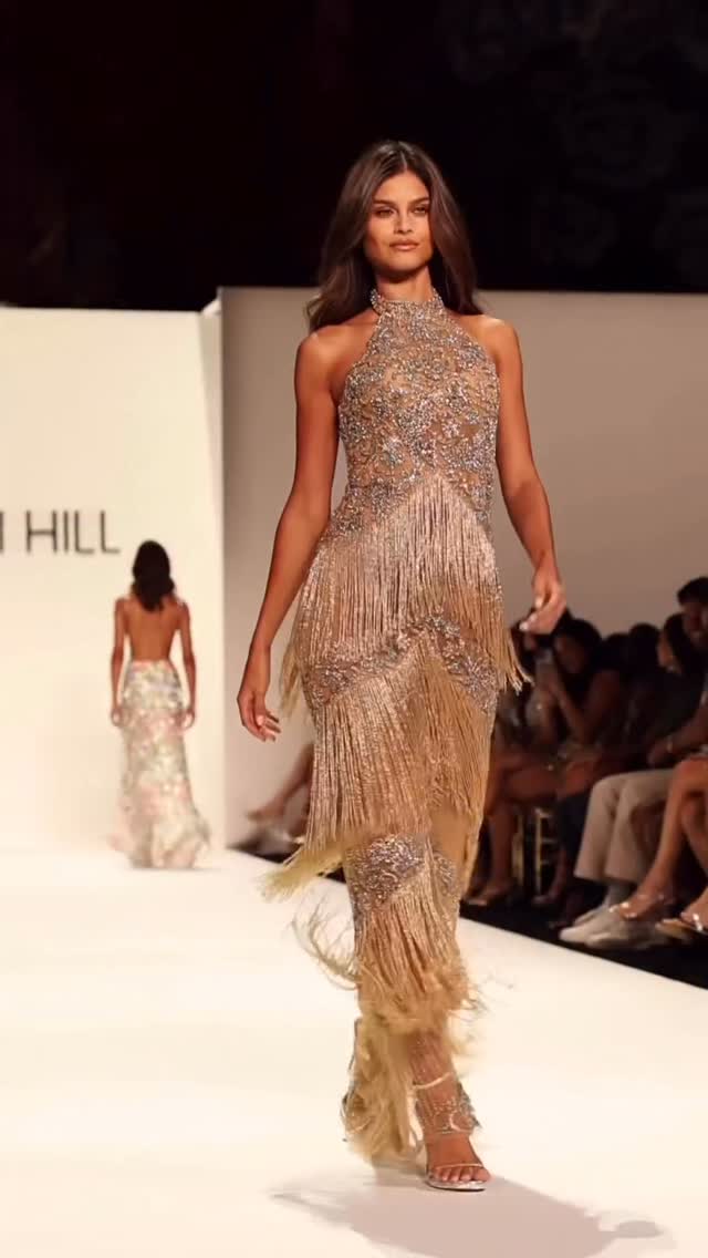 Instagram post by @elbisedunyamm for Sherri Hill. Caption reads: Fabulous! ❤️‍🔥 #SherriHill
#NYFW #Spring #2026....