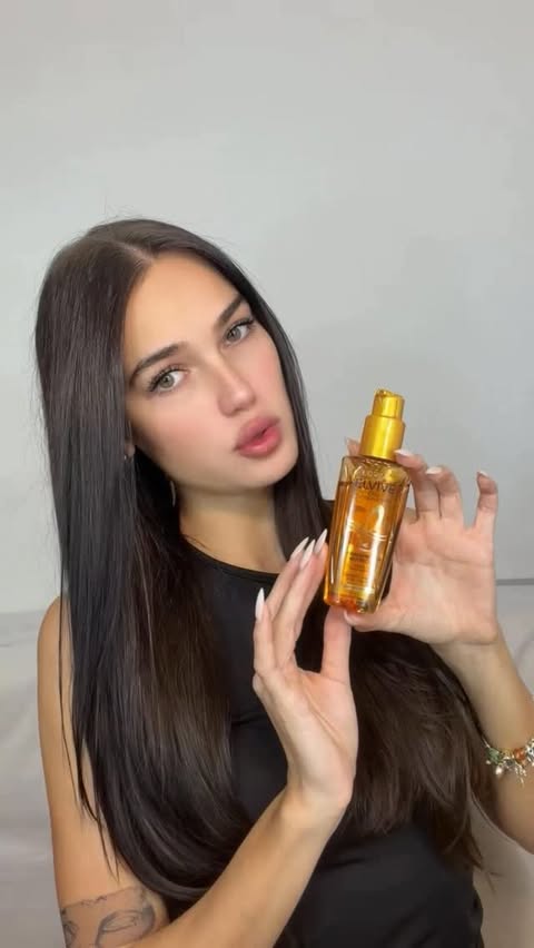Instagram post by @michemasson for L'Oréal Paris. Caption reads: Basta de pelo centrifugado 😂 El óleo....