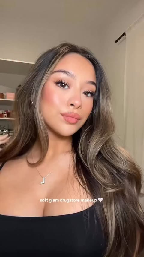 Instagram post by @leah.b for Essence Cosmetics. Caption reads: soft glam drugstore makeup routine....