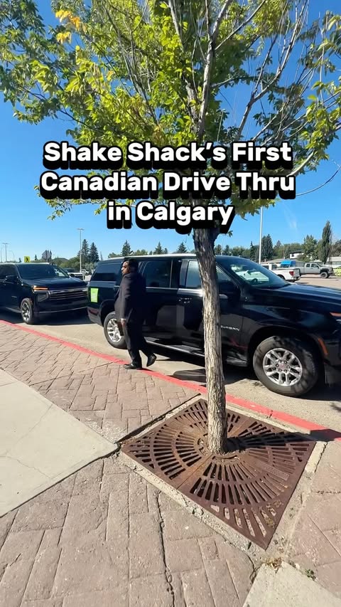 Instagram post by @yyc.cravings for Shake Shack. Caption reads: We got a sneak peek of @shakeshackca FIRST drive....