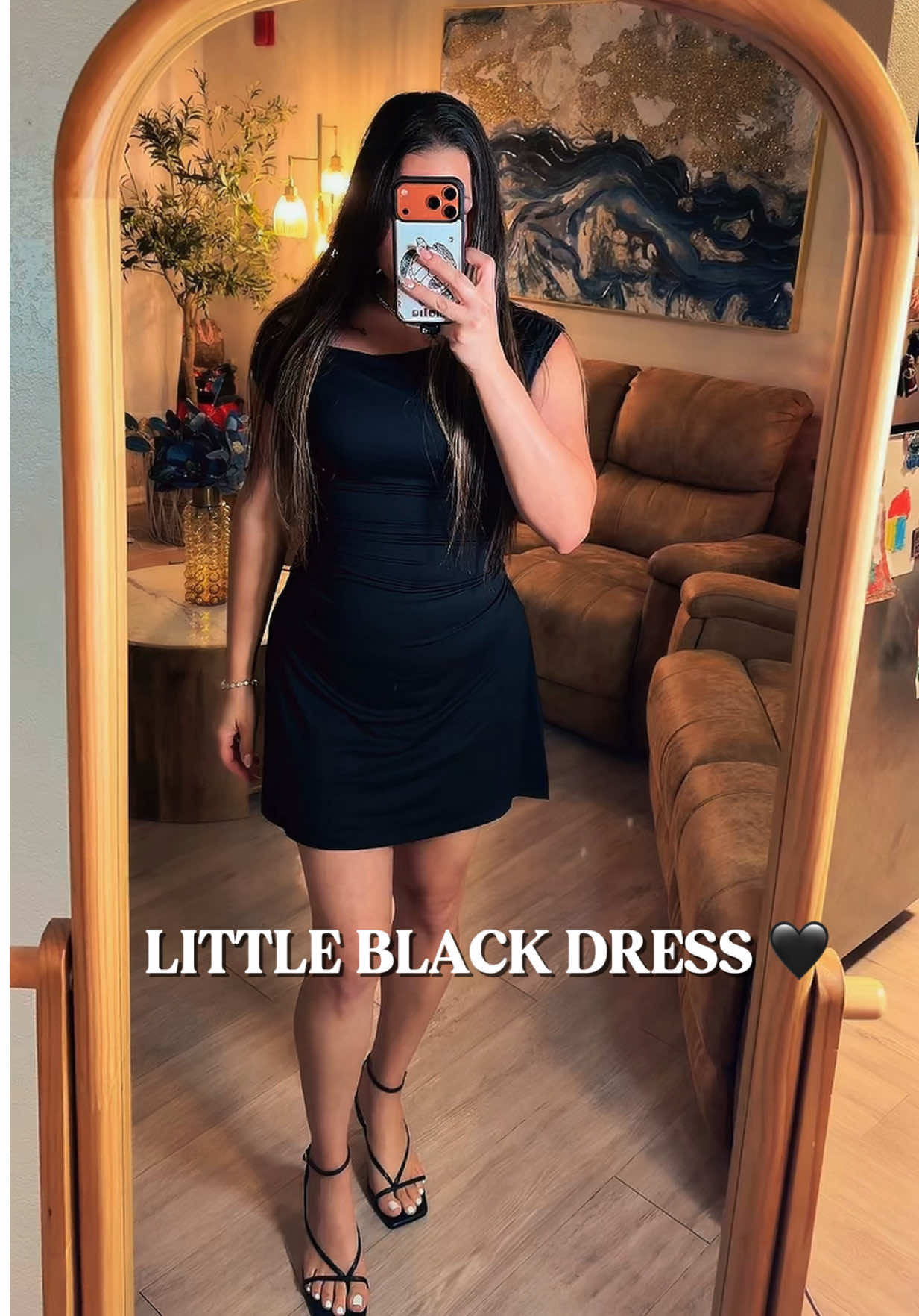 TikTok post by @lisandraharays for Hyz. Caption reads: The kind of little black dress that makes getting....