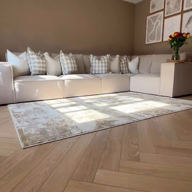Instagram post by an influencer for Brit Floors. Caption reads: [...] herringbone laminate from @britfloors [AD -....