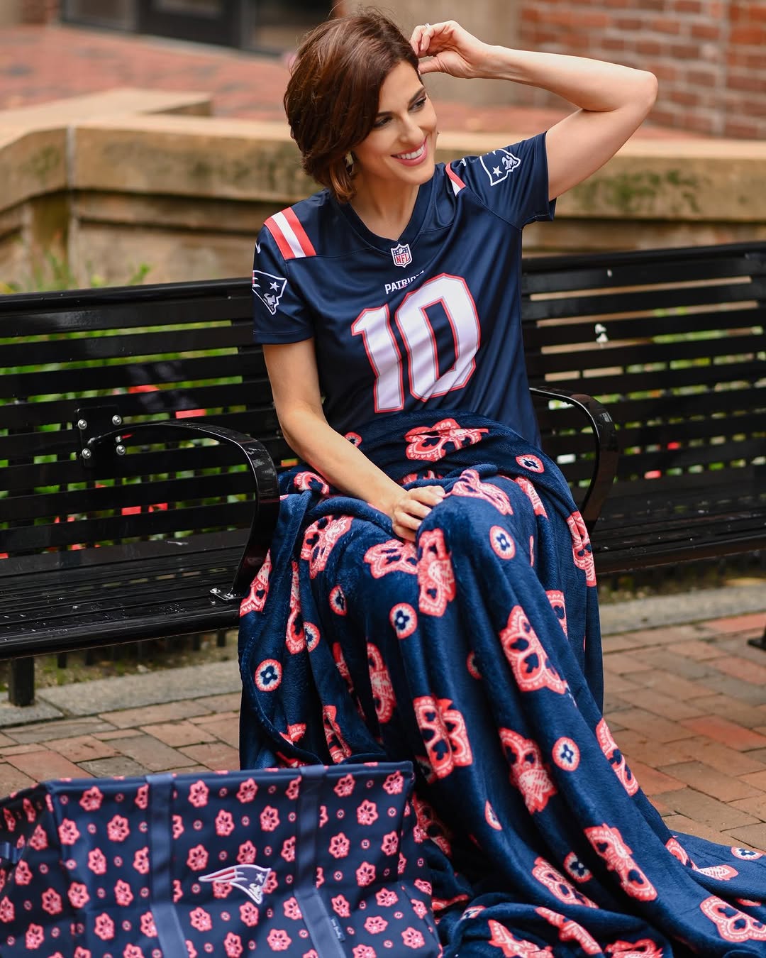 Instagram post by @antoniettabrownell for verabradley. Caption reads: Ready to cheer on the team! 🎉🏈 Let's dominate....