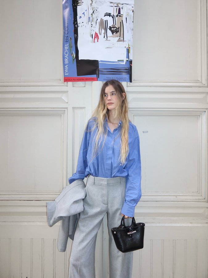 Instagram post by @irimatic for Longchamp. Caption reads: Back in the city, taking my Le Roseau out for....