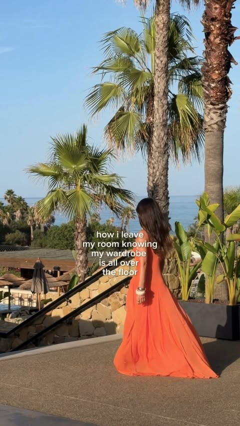 Instagram post by @emmamilton for boohoo. Caption reads: [...] ok🧡 this insane dress won tonight @boohoo....