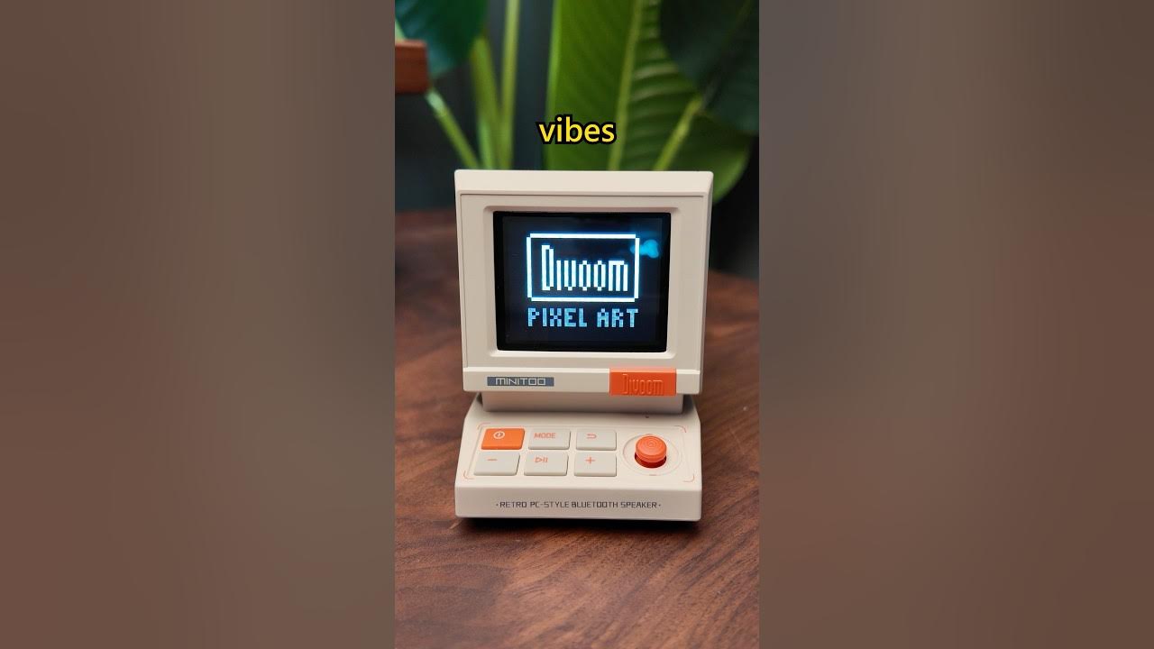 YouTube post by @DaveyG for Divoom. Caption reads: Pixel art speaker that's actually worth it #audio....