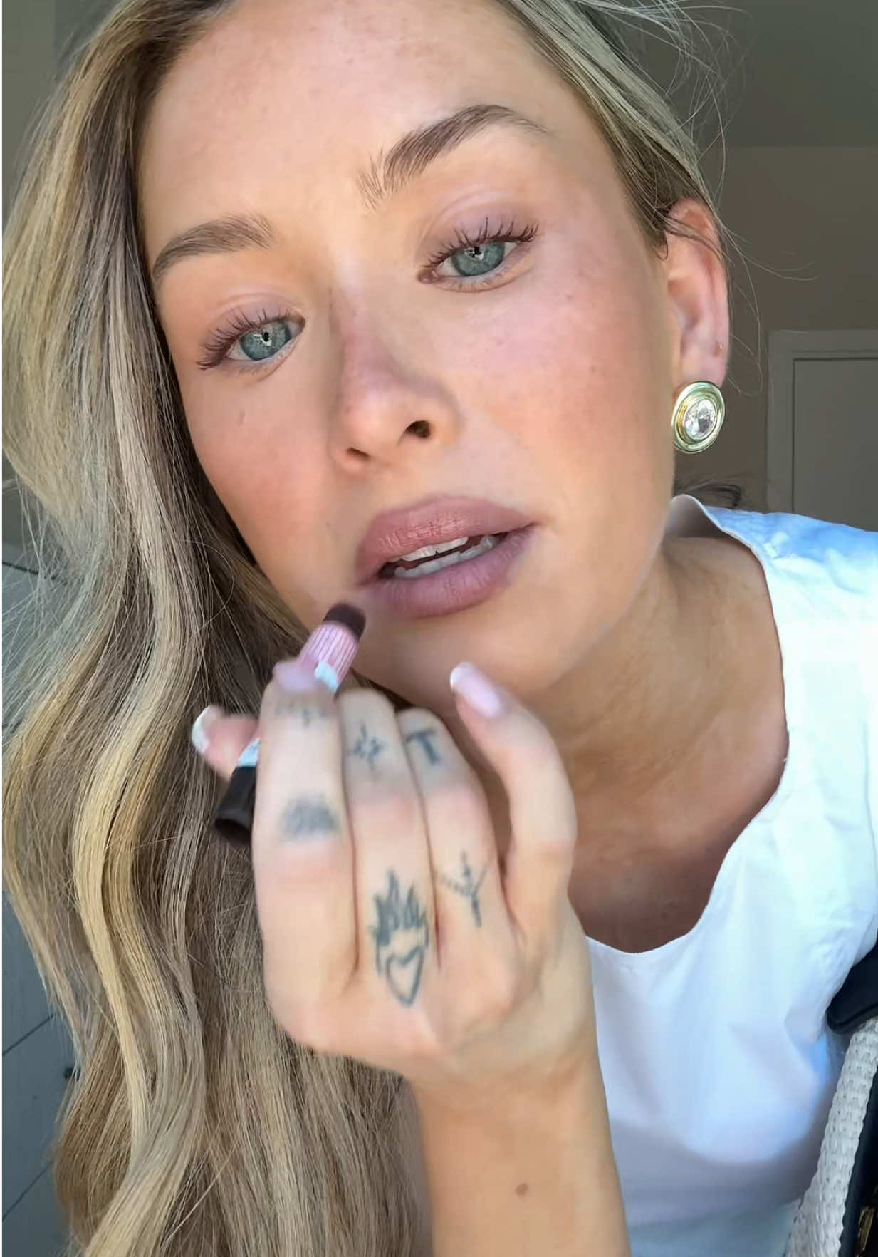 TikTok post by @laurentiby for Burt's Bees USA. Caption reads: [...] everyday essential always with me is....