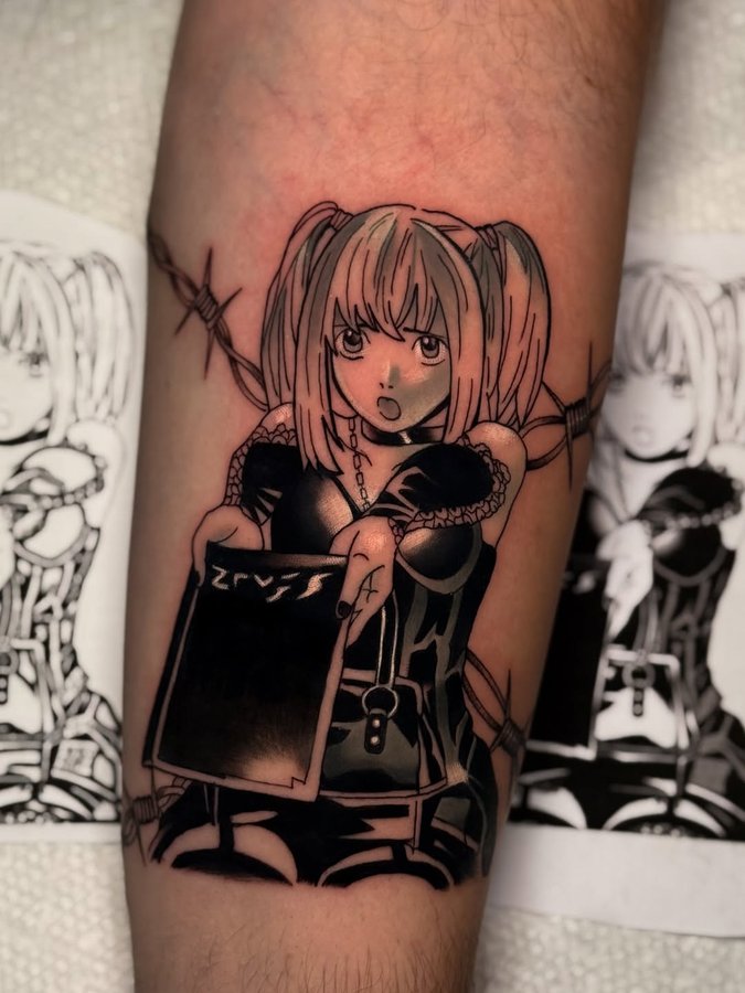 Instagram post by @otaku.tatts for Eternal Ink. Caption reads: Misa 🖤⛓️⛓️‍💥

📍456 Suffolk ave, Brentwood....