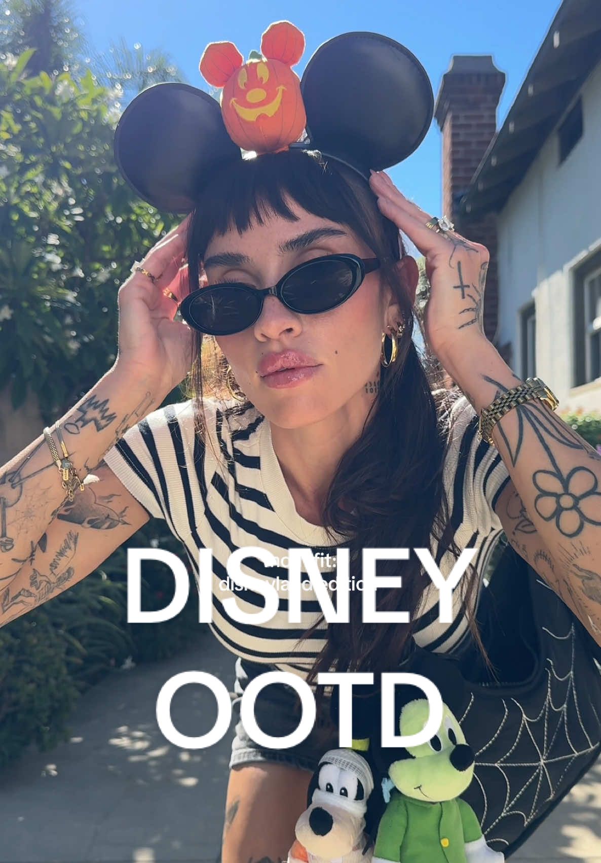 TikTok post by @ashwilbo for Wicked Misfit. Caption reads: [...] over lol @Disney Style @Disney Parks @Wicked....