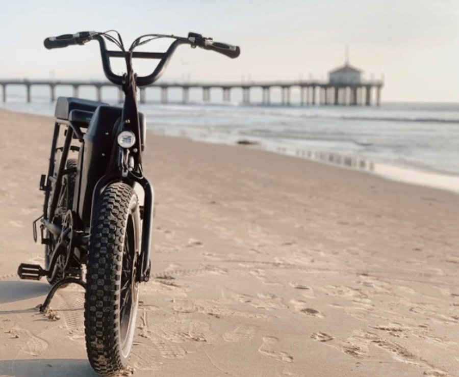 Instagram post by @officialmramirezla for Rad Power Bikes. Caption reads: High Tides and Good Vibes 

(@radpowerbikes)....