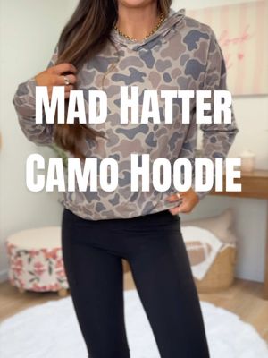 TikTok post by @shawna.likes2shop for The Mad Hatter Company. Caption reads: @The Mad Hatter Company #camo #hoodie #falloutfits....