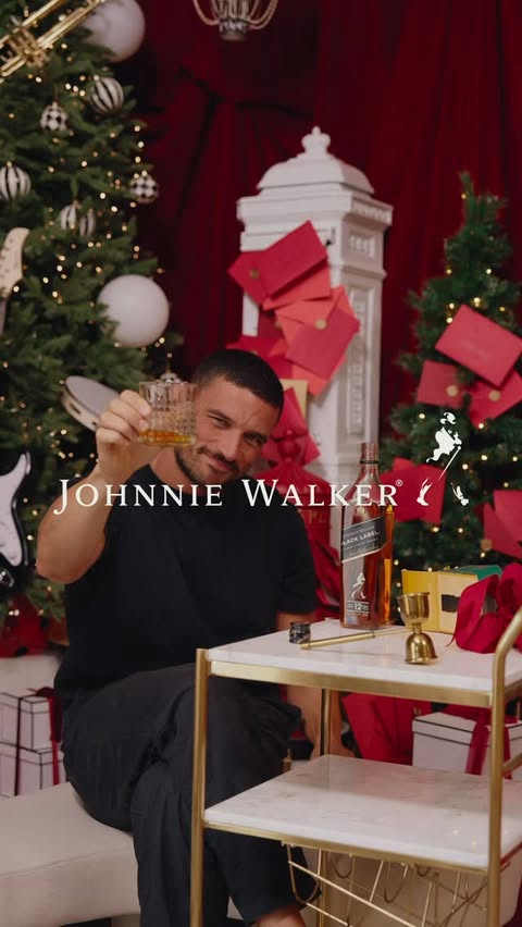 Instagram post by @shaybenmoussa for Johnnie Walker. Caption reads: Pulling ‘Dad’ for Secret Santa is tough… until you....