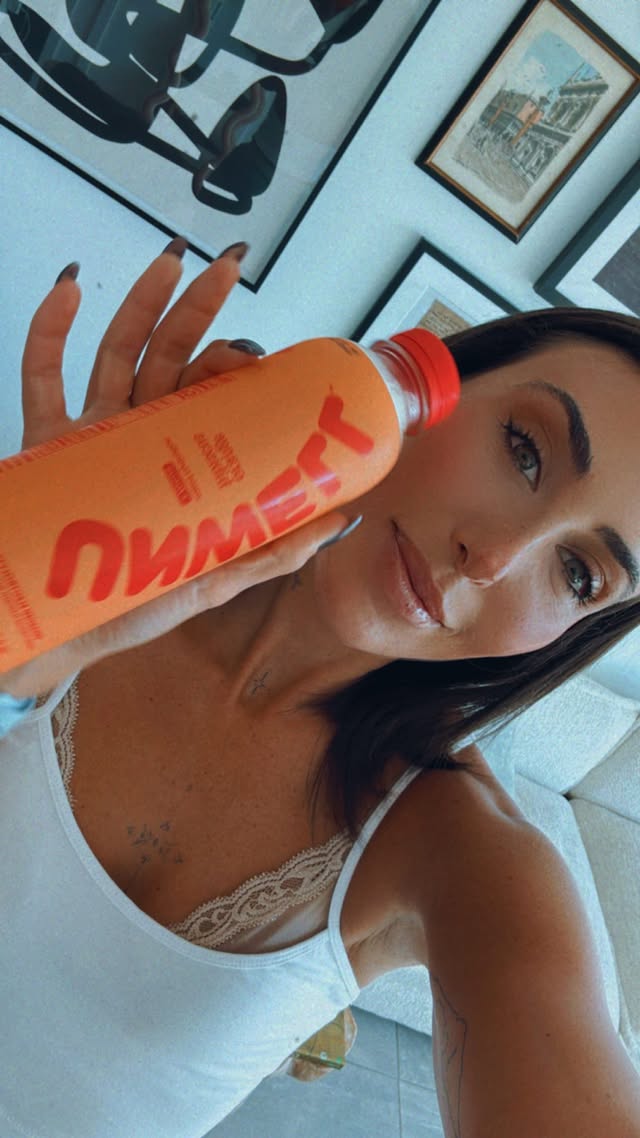 Instagram post by @lesleyagreenspan for Unwell Hydration. Caption reads: A long day calls for a drink🍹🙃 @drinkunwell • •....