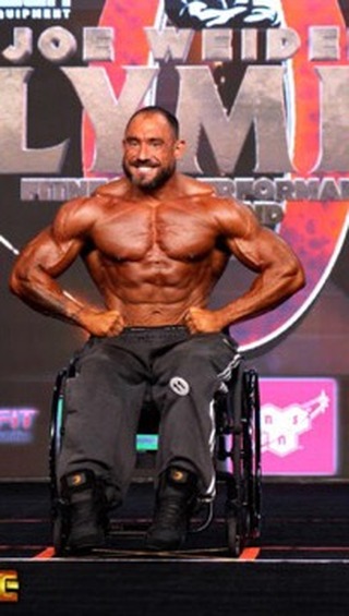 Instagram post by @ifbb_pro_league for REDCON1. Caption reads: 2024 IFBB Pro League Wheelchair Olympia 2nd Place....