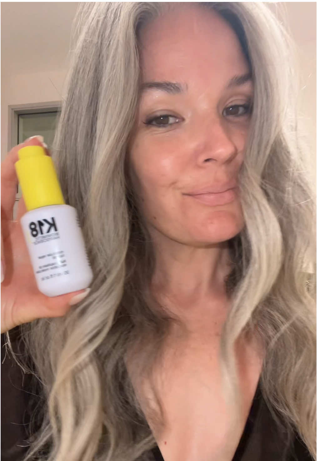 TikTok post by @april_the_grey for K18 Hair. Caption reads: [...] me show you how much I love @K18Hair....