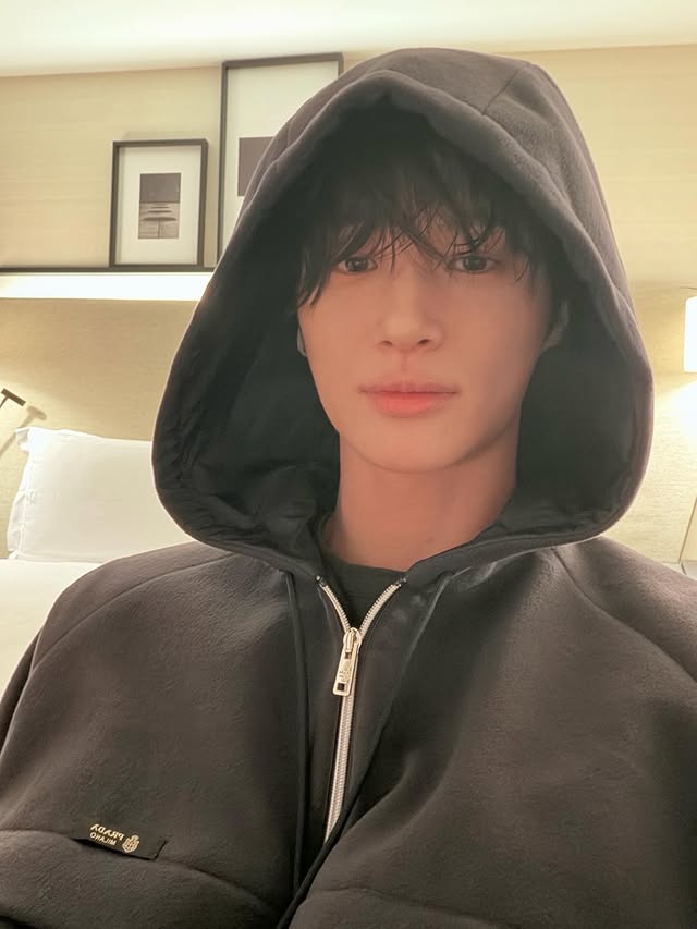 Instagram post by @byeonwooseokfeed for Prada. Caption reads: 260118 [📸] Byeon WooSeok IG Update 

#PRADA26xBWS....