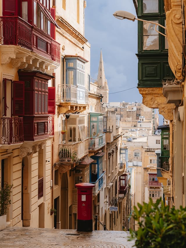 Instagram post by @mary_quincy for VisitMalta. Caption reads: [...] during such a lively time of year.....