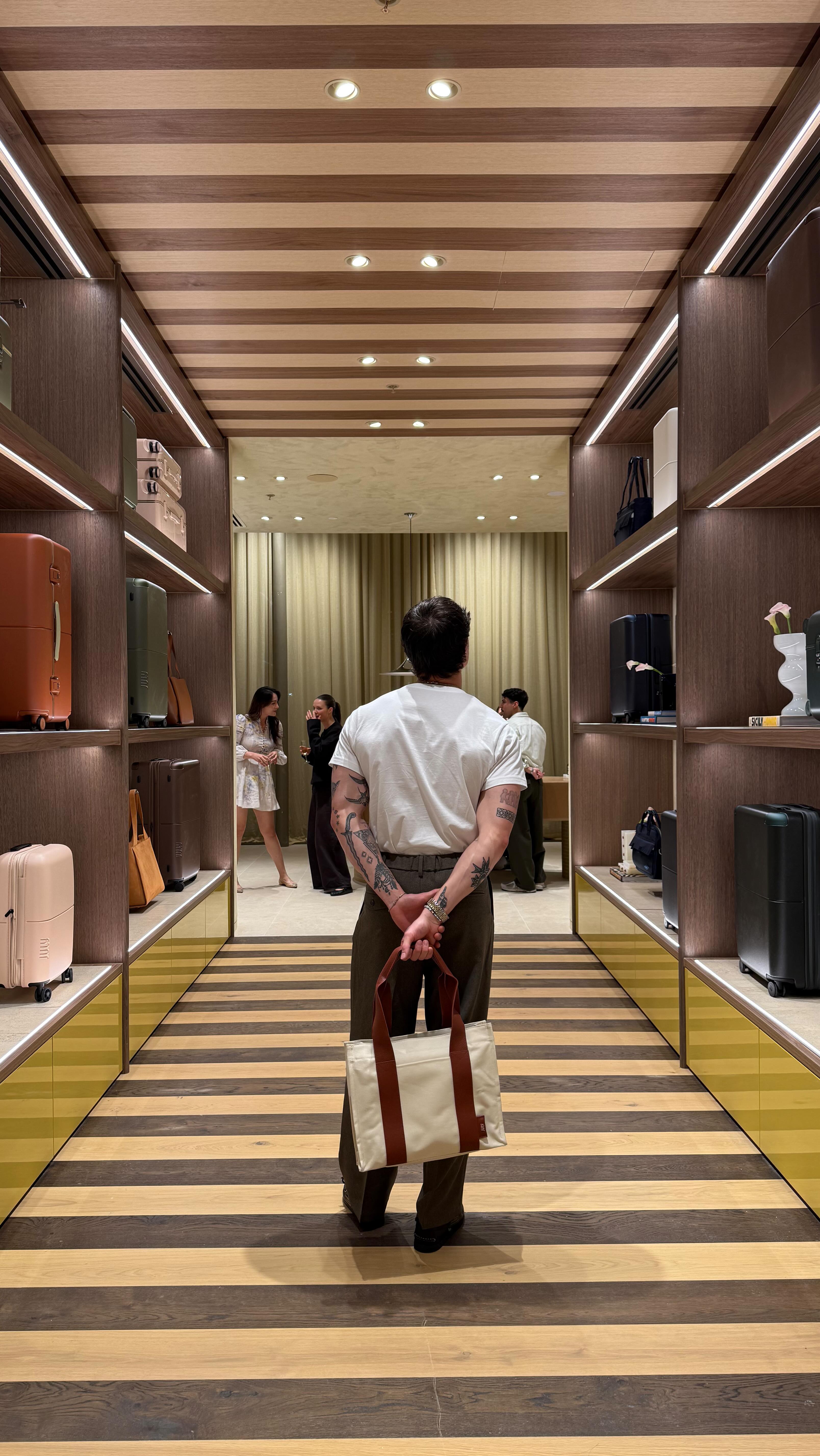 Instagram post by @_zacyoung_ for July. Caption reads: @july is in Canberra 🗣️

Opening this Saturday....