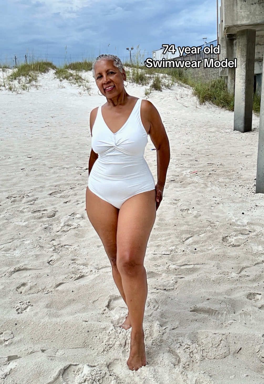 TikTok post by @sheilasfit50plus for Holipick Swimsuits. Caption reads: I’m outside at the beach in a @Holipick Swimsuits.....
