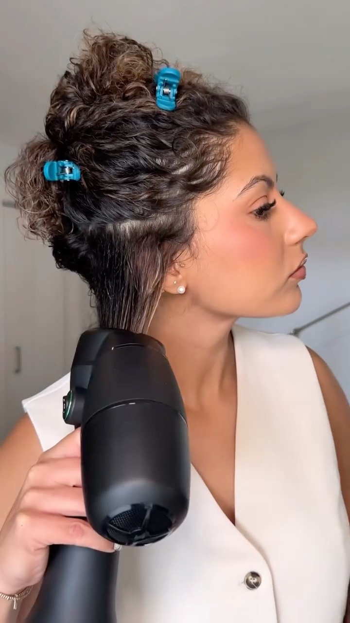 Instagram post by @amandarrwalker for RevAir. Caption reads: Just tried the @myrevair Reverse-Air Dryer for the....