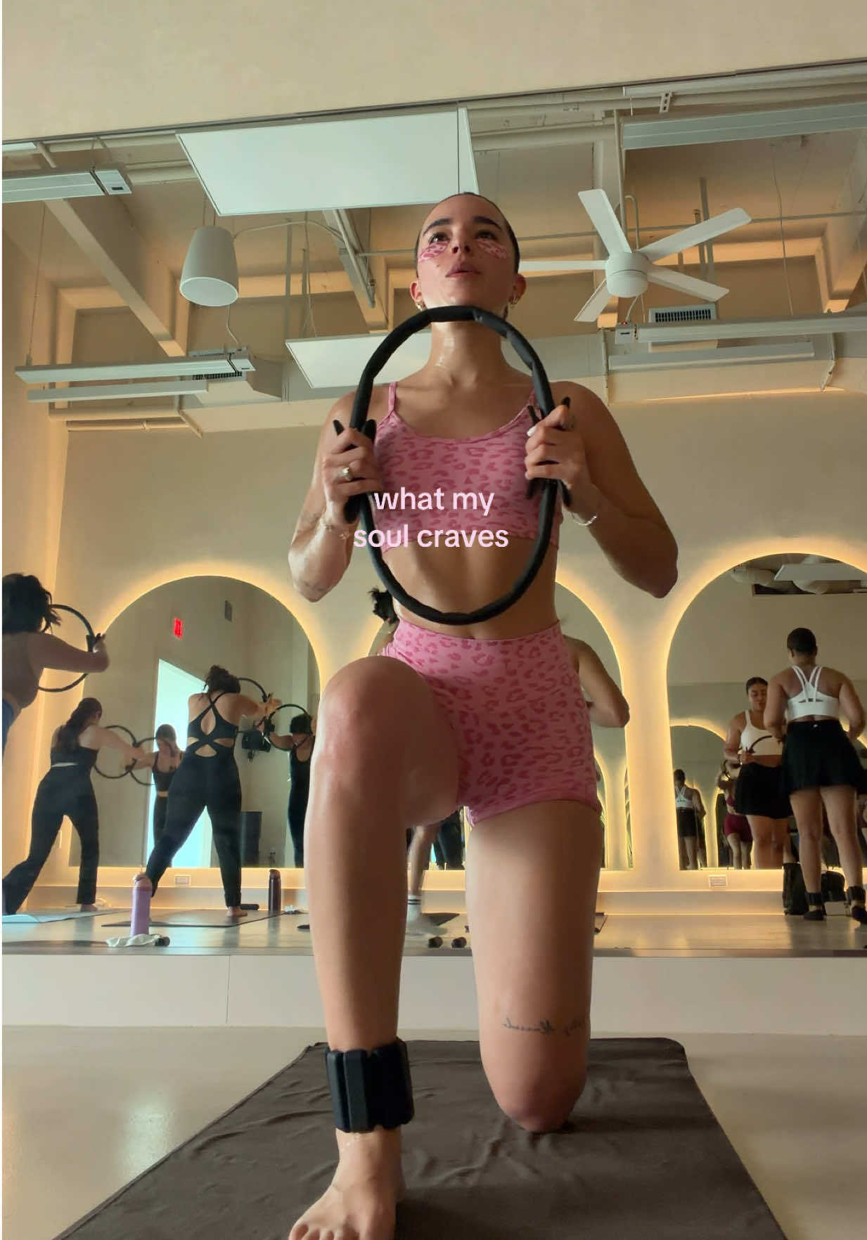 TikTok post by @angxortiz for Aurola US. Caption reads: @AUROLA #pilates #hotpilates #hotmatpilates....