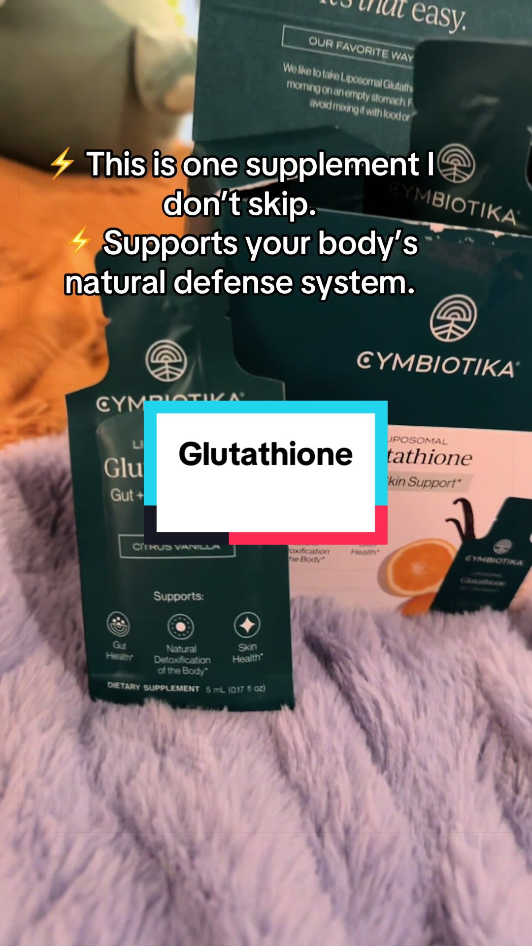 TikTok post by @mamacarrieb for Cymbiotika. Caption reads: [...] #HealthySkin #TikTokShopFinds @Cymbiotika.