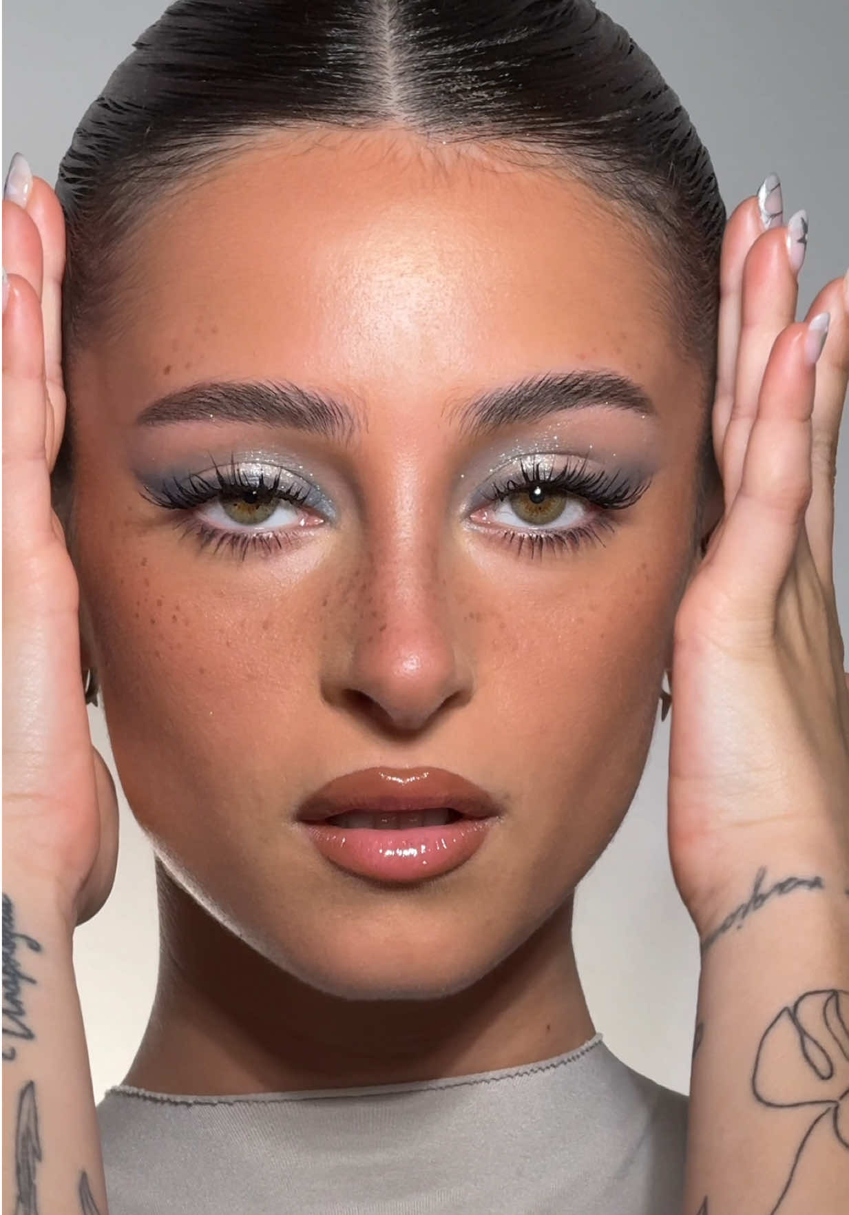 TikTok post by @mrdanielmakeup for NABLA Cosmetics. Caption reads: Cool Toned Eyes & Bronzy Skin is my Fave Look for....